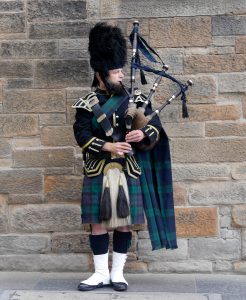 Scotland Edinburgh Bagpipes wearing Tartan Fabric